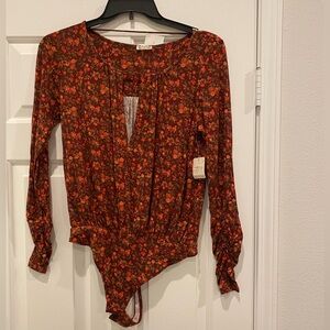 Free People bodysuit- new without tags